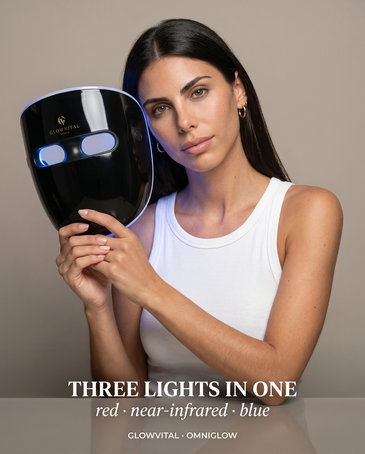 OmniGlow wireless LED face mask glowing red, worn hands-free with no cables